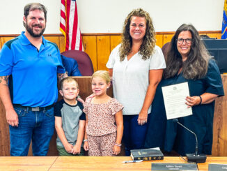 Ashley Sayers, backed by her husband, Everett, and their son and daughter, and Emerson mayor Danielle DiPaola (at right), is the newest member of the Borough Council, sworn Aug. 13, 2024. Courtesy photo