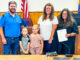 Ashley Sayers, backed by her husband, Everett, and their son and daughter, and Emerson mayor Danielle DiPaola (at right), is the newest member of the Borough Council, sworn Aug. 13, 2024. Courtesy photo