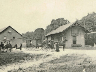 Dated to around 1900, this photograph captures a scene outside the Woodcliff railroad station in an era before automobiles. A sign on the depot reads Woodcliff, placing this before 1910 when Lake was added to the name. The change reflected the borough's new man-made reservoir.