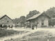 Dated to around 1900, this photograph captures a scene outside the Woodcliff railroad station in an era before automobiles. A sign on the depot reads Woodcliff, placing this before 1910 when Lake was added to the name. The change reflected the borough's new man-made reservoir.