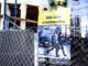 Signs warn pedestrians near the stalled Emerson Station redevelopment project in April 2024. John Snyder photo