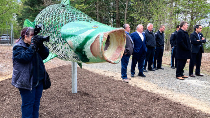 Finn the Green Gobbler, Veolia's massive fish sculpture with an even bigger message about protecting our planet, is unveiled at Woodcliff Reservoir in spring 2023 to celebrate Earth Month – and to encourage residents to take action to protect the watershed. At 11 feet long, Finn is constructed from repurposed metals and is hollow so visitors to the reservoir can fill it with plastic debris they find in the area. Finn’s belly is big enough to hold more than 15 trash bags of plastic bottles. John Snyder photo.