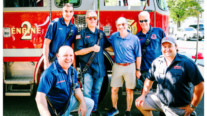 The Demarest Volunteer Fire Department ads its energy to the fun at Demarest Day, connecting with the community and enjoying a day of celebration together. Hillary Viders photo.