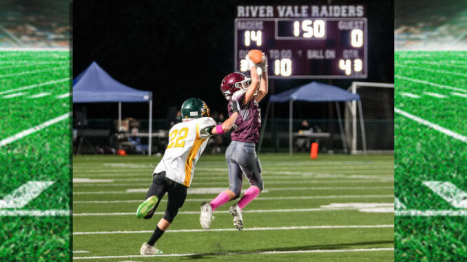 Senior River Vale Raider DB, Tyler Hurst (#38) leaps in front of his receiver to pick off a pass and put the game away.