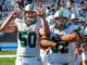 Senior OL/DL Shane Burke (#50) and junior OL/DL Jake Wawra (#62) celebrate Pascack Valley’s 5-1 record after the win over Paramus. Mike Smith photo.