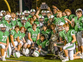 The Pascack Valley Panthers hoist their trophy and celebrate their third consecutive win over the River Dell Golden Hawks in the coveted 2024 Rumble for the Rail. Courtesy Mike Smith/cdmphotovideo