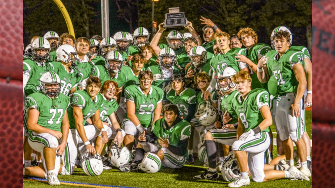 The Pascack Valley Panthers hoist their trophy and celebrate their third consecutive win over the River Dell Golden Hawks in the coveted 2024 Rumble for the Rail. Courtesy Mike Smith/cdmphotovideo