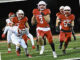 Cardinals running back #3, Steven Klein, sprints down the sideline on a 57-yard touchdown run, putting the team up 7-0. Paul R. Sullivan — paulsullivan4photography.com