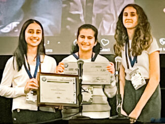 Maya Faehndrich, Ayana Mehta, and Sophia Saroufeem of Demarest Middle School proudly display their award for securing second place in the prestigious NJSBA STEAM Tank Challenge, guided by their teacher Ms. Joanne Werner.