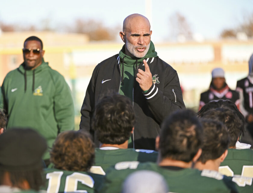 Head Coach Augie Hoffmann rallies the Green Knights after their 20-7 win over St. Peter's Prep. Paul R. Sullivan photo