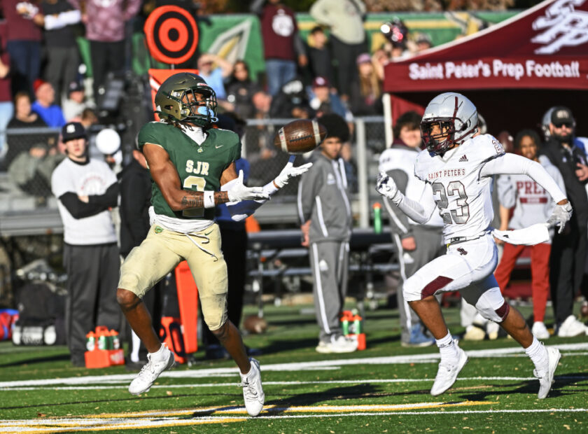 Wide receiver Mekhi Rossignol (#2) makes a spectacular catch near the St. Peter's sideline, turning it into a 34-yard touchdown to push the score to 17-0. Paul R. Sullivan photo