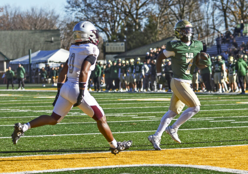 Running back Nathan Bailey (#7) powers into the end zone for a 1-yard touchdown, putting St. Joseph Regional on the board, 7-0. Paul R. Sullivan photo