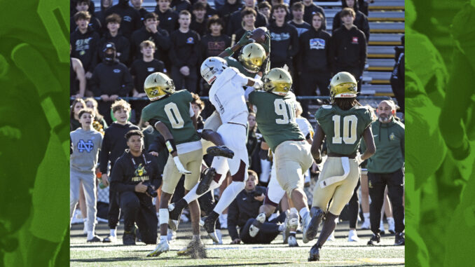 Travon Chardonet (#6), cornerback for St. Joseph Regional, snags an interception along the sideline during the second quarter. Paul R. Sullivan photo