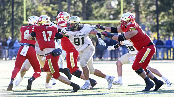 St. Joseph Regional H.S. Green Knights defensive lineman #91 Vincent Ferrara pressures Bergen Catholic quarterback #17 Dominic Campanile out of the pocket in Oradell on Nov. 23, 2024. Paul R. Sullivan / paulsullivan4photography.com.