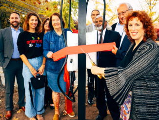 Joe Desimone, COO of Greenspot; Jennifer Jackson, Tenafly Downtown Committee; Susan Corrado, Tenafly CFO (in back); Olga Milanos, chair of the Tenafly Environmental Commission (holding the ribbon); David Fanslau, Tenafly borough administrator (behind Venu Menon); Councilman Venu Menon; Mayor Mark Zinna; and Councilwoman Dr. Julie O’Connor at the Oct. 30, 2024 ribbon-cutting ceremony. Hillary Viders photo.