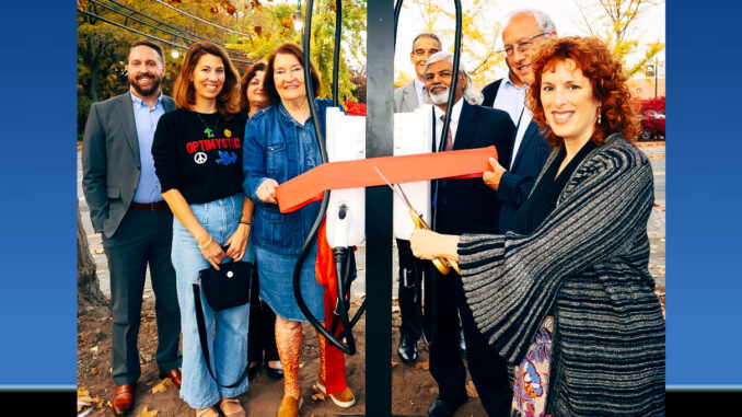 Joe Desimone, COO of Greenspot; Jennifer Jackson, Tenafly Downtown Committee; Susan Corrado, Tenafly CFO (in back); Olga Milanos, chair of the Tenafly Environmental Commission (holding the ribbon); David Fanslau, Tenafly borough administrator (behind Venu Menon); Councilman Venu Menon; Mayor Mark Zinna; and Councilwoman Dr. Julie O’Connor at the Oct. 30, 2024 ribbon-cutting ceremony. Hillary Viders photo.