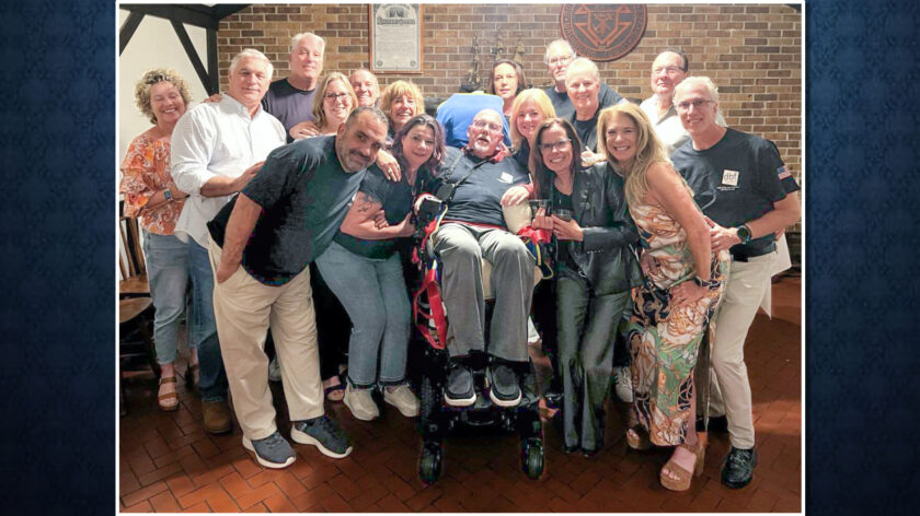 With the support of his wife, Alissa, and their children, Kristian and Hannah, and many friends old and new — here, the first major DBF fundraiser at the Knights of Columbus in Washington Township — Dennis Burke embraced his journey with resilience, dignity, and humor. Credit: Mary Evans.