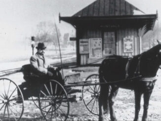 A gent keeps warm in his horse-drawn buggy in this photograph snapped outside the Montvale railroad. This original station no longer stands; an arsonist burned it in 1921.