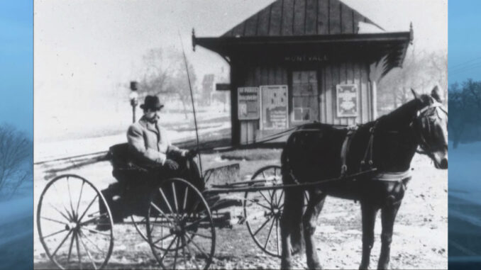 A gent keeps warm in his horse-drawn buggy in this photograph snapped outside the Montvale railroad. This original station no longer stands; an arsonist burned it in 1921.