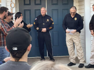 Members of the township’s police and fire departments and ambulance corps gather with members of the community on Dec. 18, 2024 to congratulate and thank Sgt. Riedel on his 26 years of exemplary service. WTPD/Facebook