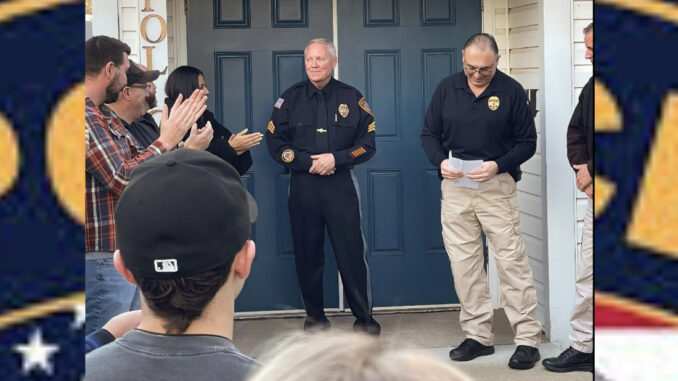 Members of the township’s police and fire departments and ambulance corps gather with members of the community on Dec. 18, 2024 to congratulate and thank Sgt. Riedel on his 26 years of exemplary service. WTPD/Facebook