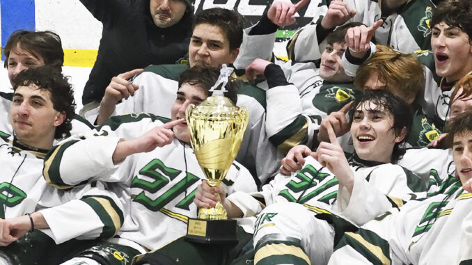 St. Joseph Regional H.S. Green Knights hockey team take their due as Bergen County hockey champs, Jan. 22 in Wayne. Detail of photo by Paul R. Sullivan.