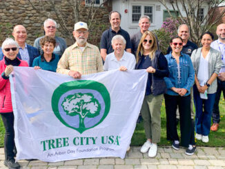 Front to back, left to right: Marilyn Clark, Roberta Green, Clay Bosch, Josephine Higgins, Councilwoman Julie Brodsky, Councilwoman Jacqueline Margolis, Katie Murphy; David Berger, Vaughn Flower, Council President Craig Stern, borough arborist Ray Slaman, property maintenance manager Lyle Garcia, and Principal Michael Andriulli gather at Woodcliff Lake Middle School on Friday, April 25 2025 for the borough’s Arbor Day celebration, this year also honoring longtime Shade Tree Committee leader Clay Bosch. (Courtesy photo)