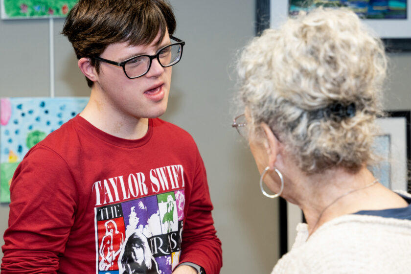 Guests connect over creativity and shared appreciation for the artists' work. the Fifth Annual Hillsdale Access For All Art Show For People With Disabilities exhibition runs all month at Hillsdsale Free Public Library. John Snyder photo.