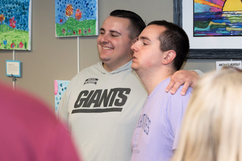 Making time for fans at the Fifth Annual Hillsdale Access For All Art Show For People With Disabilities. The opening reception was May 1 at the Hillsdale Free Public Library. John Snyder photo.