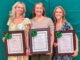 Left to right: Fawn Kennedy of Meadowbrook School, Jenna Santana of Ann Blanche Smith School, and Kathleen “Katie” Eriksson of George White Middle School. The three were recognized as Teacher of the Year during the May 12 school board meeting. Submitted photo.