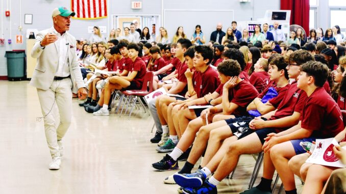 3R's Day keynote speaker Jim Stroker addressing entire student body at Fieldstone Middle School on June 6. Sean Powers photo.