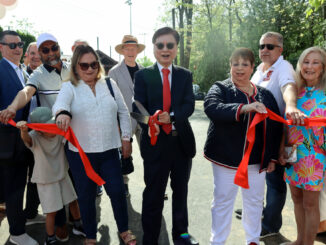 Mayor Mark M. Park is joined at the ribbon-cutting ceremony by councilmembers Tim Koutroubas, Zhi Liang, Rashid Patel, and Rivka Biegacz; Police Chief William Henkelman; members of the police, fire, and public works departments; North New Jersey Chamber of Commerce President Carol Rauscher; and Stephanie Jang, interim director of recreation. Hillary Viders photo.