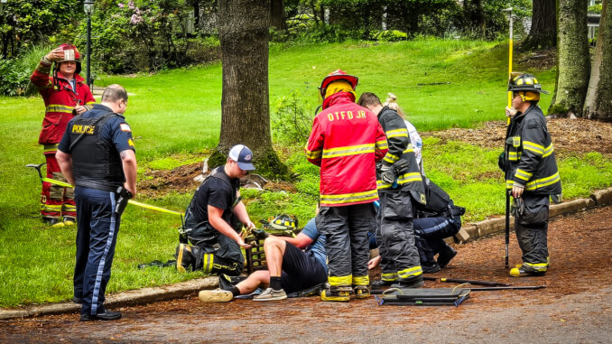 Firefighters perform one of the six fireground tasks: Search and Rescue. OTFD photo.