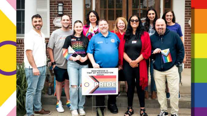 WW Pride 2025 feat Among those powering the Third Annual Westwood Pride Celebration June 1: Chris Doran; Chris Haffler; Mackenzie Fox; county commissioners Germaine Ortiz, Tom Sullivan, and Mary Amoroso; Ann-Marie Jonas; Casey Bontemps; Bob Dzienis; and Lisa Bontemps. John Snyder photo set against the Intersex-Inclusive Progress Pride Flag.