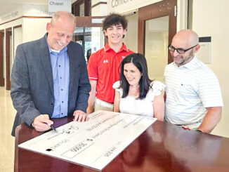From left: Tom Bisignani, Pascack Valley Medical Center CFO; Lori Schwartz; Jonathan Schwartz; and Jordan Schwartz. The Schwartz family met with PVMC leadership following the hospital’s $30,000 commitment to the Cardinals Cardiac Commitment initiative, which Jordan launched to expand student heart screenings at Westwood Regional High School.