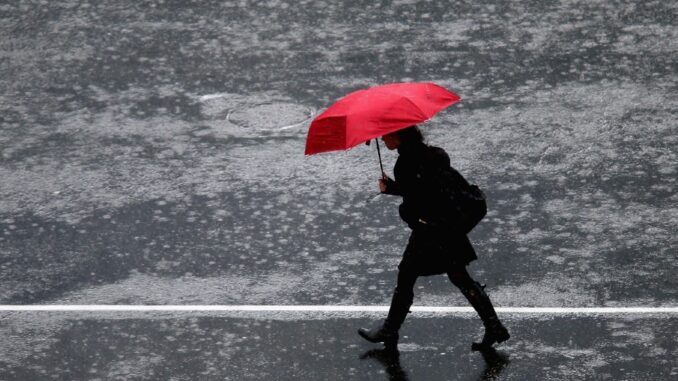 rain-1000_jason-oxenham-getty A person braces against heavy rainfall with an umbrella during a summer downpour. rain-1000_jason-oxenham-getty