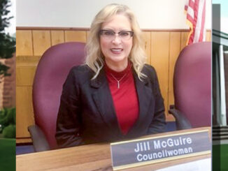 Councilwoman Jill McGuire, honored with a plaque and flowers by the mayor and council for nearly seven years of service, including two as chair of the local historic preservation committee. McGuire resigned effective Aug. 31, citing an upcoming move from the community.