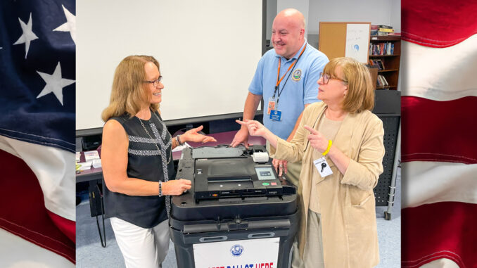 Township Clerk Sue Witkowski talks with Bergen County elections officials Debra Francica and Wes Wagner following their Sept. 24 presentation to residents on the upcoming Nov. 4 General Election, which includes the statewide race for governor. Mike Olohan photo.