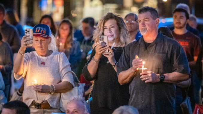 Mourners hold candles during a vigil for Charlie Kirk at Veterans Memorial Park in Westwood on Sept. 20, 2025. The event drew local officials and community members who spoke about Kirk’s legacy, political violence, and the need for unity. John Snyder/Pascack Press.