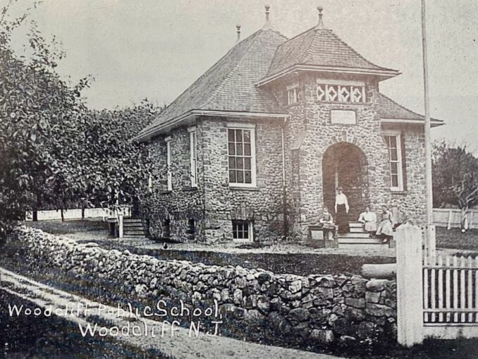 The Woodcliff schoolhouse opened 130 years ago this week, on Sept. 9, 1895. The borough had broken off from Washington Township just a year earlier. Designed by an architect who also became the first mayor, the building was constructed with stones gathered from the surrounding fields of the farming community. Pictured here are teachers and several students on the front steps, circa 1905.