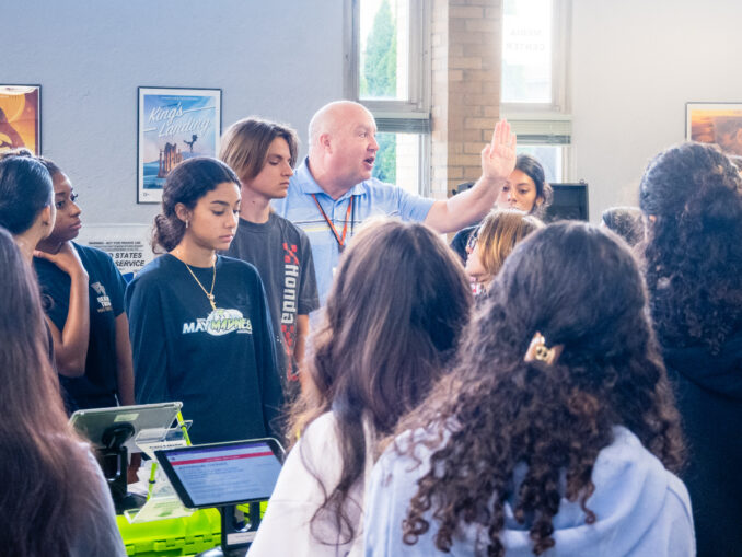 Lead trainer Wes Wagner of the Bergen County Board of Elections (center) and Chairman of the Bergen County Board of Elections Richard L. Miller on Sept. 30 orient dozens of Westwood Regional High School students to facilitating the general election, which is Tuesday, Nov. 4. The work is nonpartisan and vital. John Snyder photo.