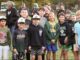 Aspiring Hillsdale athletes gather to witness the start of the Memorial Field project, looking forward to playing on new football, baseball and softball fields. Anthony DeRosa photo.