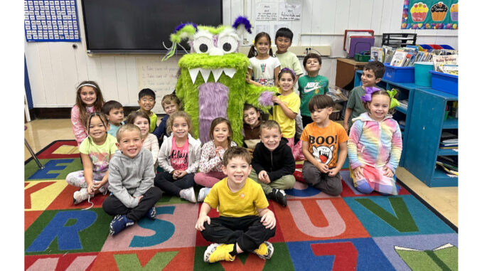Monster Gerald at Washington School 2025 The creation of PSO secretary Kristy O’Connor, monster Gerald (middle of photo, green fur) emerged to help with Trunk of Treat. He’s made a much more meaningful connection in the life of Washington School. Photos by school parent Maureen Colombo.