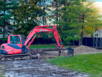A new driveway for Department of Public Works vehicles takes shape at the Bethany property in this Nov. 1 photo. A final public hearing on the plan to lease space from the church is scheduled for the Monday, Nov. 10 council meeting. (Photo by Mike Olohan)