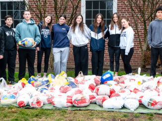 More than 300 turkeys were collected at the 33rd Annual Helping Hand Food Pantry Turkey Drive, thanks in part to student volunteers who helped unload and sort donations on Saturday, Nov. 22, 2025. John Snyder photo.