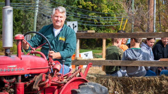 Jeffrey Piatt, founder & owner of Montvale Landscaping, drives guests of all ages young at heart around Montvale’s 8.4-acre farm in his 1935 Farmall during the borough’s Oct.18 Town Day at the Farm festivities. Photo credit: John Snyder.
