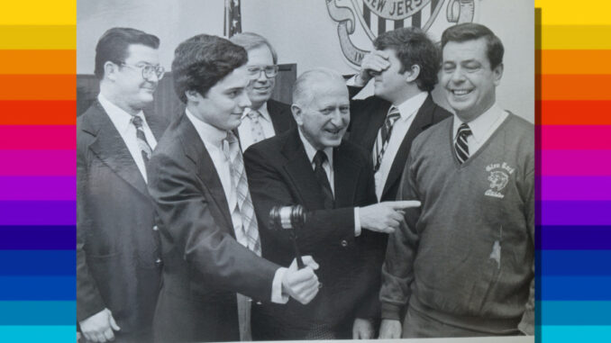 Park Ridge officials are amused and mortified in equal measure as their mayor, Donald F. Gelnaw, sports a Glen Rock football sweatshirt at the Dec. 10, 1980 meeting of the governing body. A good sport, Gelnaw was fulfilling the terms of a wager with that borough’s mayor after the state championship tipped Glen Rock’s way, 22-21. Photo: Thomas Moorhead