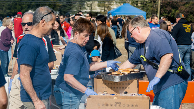 Volunteers work Montvale's inaugural Town Day at the Farm at the former DePiero property on Craig Road Oct. 18, 2025. The borough acquired the land and intends to keep it for agricultural and recreational uses. John Snyder photo.