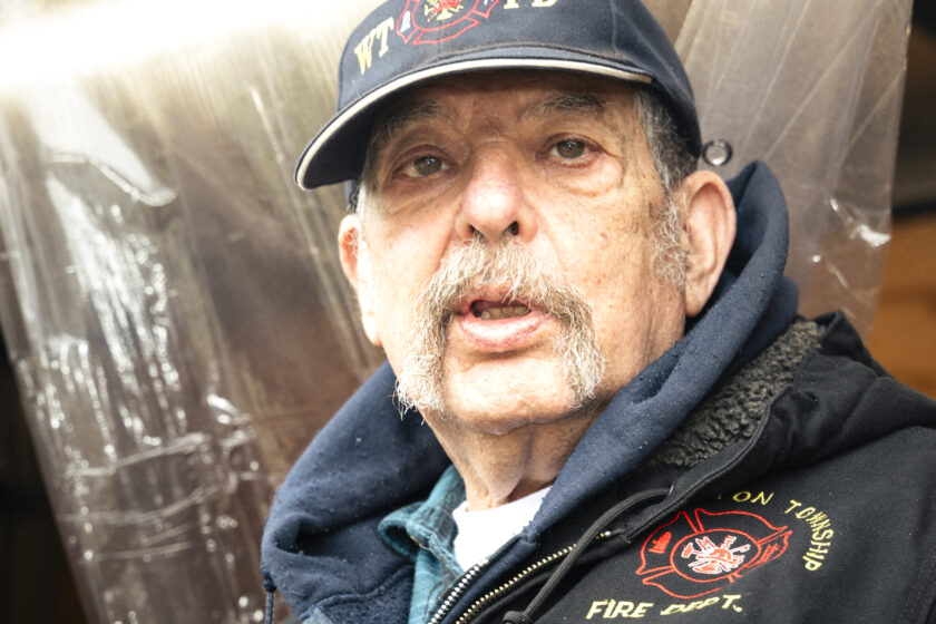 Former Fire Chief Jimmy Zaconie lends a hand at the Washington Township Volunteer Fire Department’s tree sale. Zaconie and his wife, Doris — who makes the wreath bows each year — are among the longtime volunteers keeping the tradition strong. John Snyder photo.