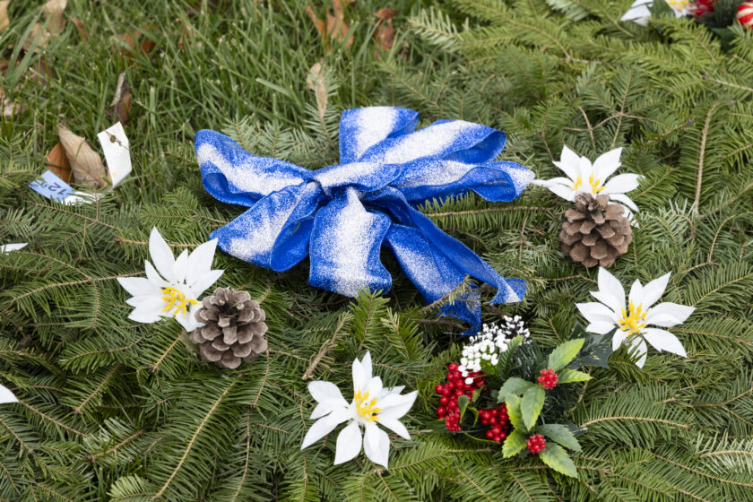 Doris Zaconie decorated the WTFD's Christmas wreaths, for sale at the annual tree sale at Memorial Field. John Snyder photo.